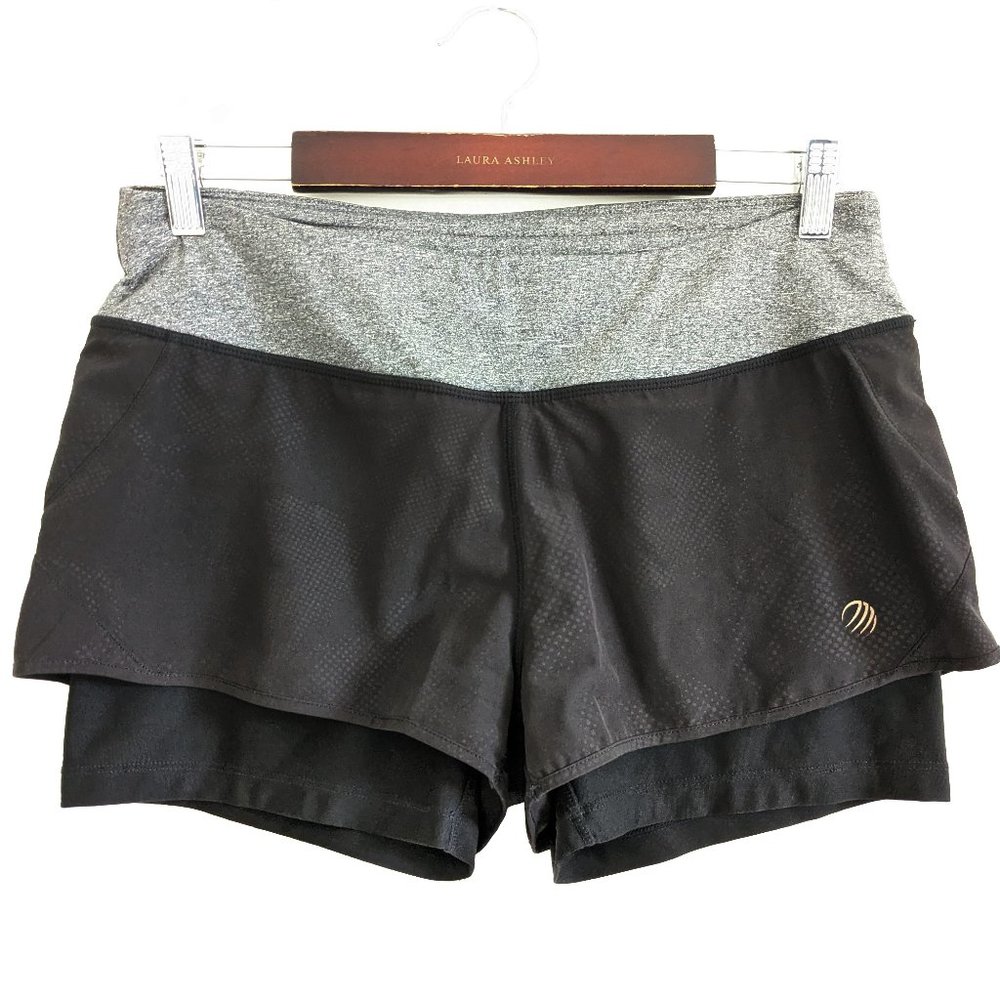 mpg black athletic shorts size small with yellow back zipper pocket and liner